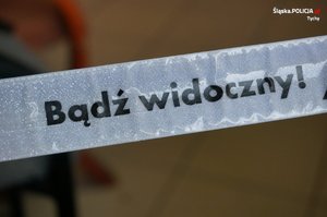 Odblask z napisem &quot;Bądź widoczny&quot;